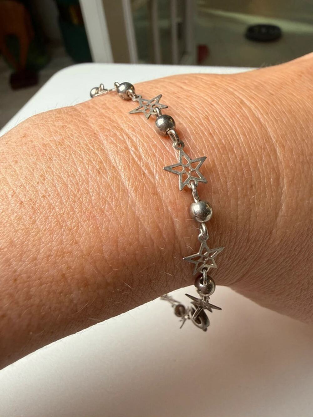 Delicate silver tone celestial star and moon bracelet 8.5”